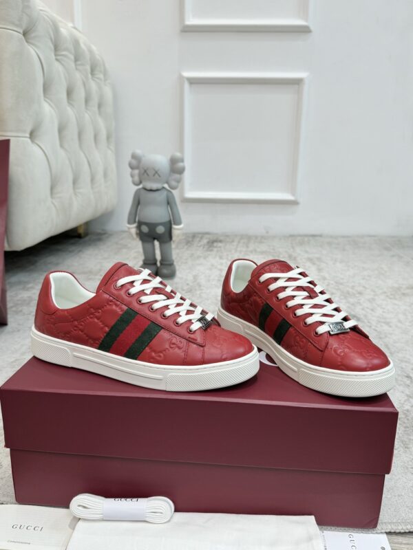 sy_no_7F1D635BC94D8FBAB54A549D0EA07F87_5 Gucci GG Embossed Leather Screener Sneaker in Red