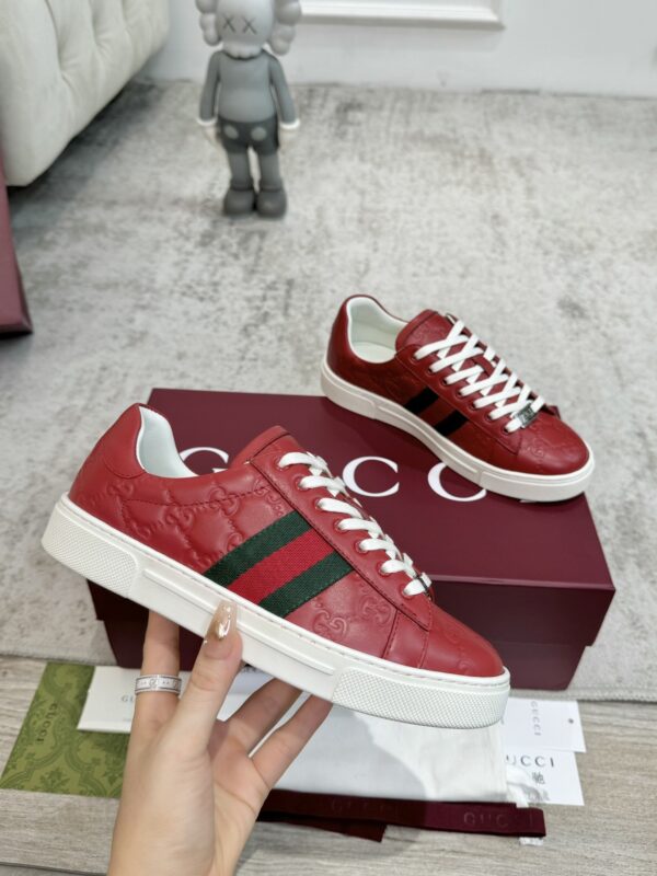 sy_no_7F1D635BC94D8FBAB54A549D0EA07F87_6 Gucci GG Embossed Leather Screener Sneaker in Red