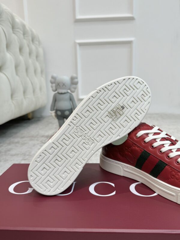sy_no_7F1D635BC94D8FBAB54A549D0EA07F87_8 Gucci GG Embossed Leather Screener Sneaker in Red