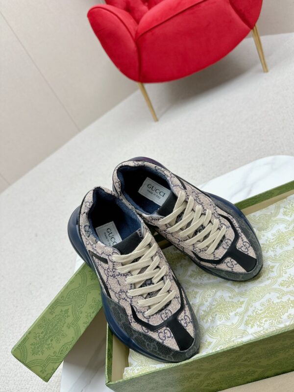 sy_no_80A4732C9506F001CF5145D2E9700428_5 Gucci Rhyton GG Canvas Sneaker in Black & Beige
