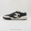 Chanel Black-White Mixed-Material Low-Top Sneaker with Quilted Leather and CC Logo