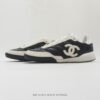 Chanel Black-White Mixed-Material Low-Top Sneaker with Quilted Leather and CC Logo