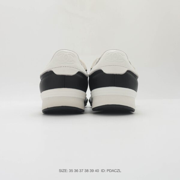 Chanel Black-White Mixed-Material Low-Top Sneaker with Quilted Leather and CC Logo