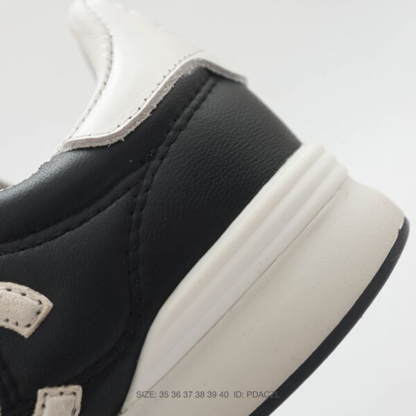 Chanel Black-White Mixed-Material Low-Top Sneaker with Quilted Leather and CC Logo