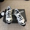 sy_no_87031BBE529B659C1F04D1A4A1F9094B_2 Chanel White and Black Colorblock Low-Top Sneaker with CC Logo