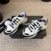 sy_no_87031BBE529B659C1F04D1A4A1F9094B_3 Chanel White and Black Colorblock Low-Top Sneaker with CC Logo
