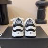 sy_no_87031BBE529B659C1F04D1A4A1F9094B_8 Chanel White and Black Colorblock Low-Top Sneaker with CC Logo