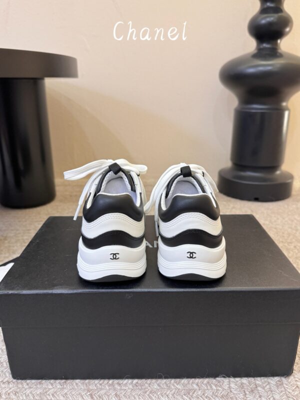 sy_no_87031BBE529B659C1F04D1A4A1F9094B_8 Chanel White and Black Colorblock Low-Top Sneaker with CC Logo