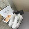 sy_no_878C2928CDBA44C004805BC79FF023A1_1 Prada White Canvas Black-Trim Triangle Tread Platform Sneaker