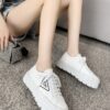 sy_no_878C2928CDBA44C004805BC79FF023A1_2 Prada White Canvas Black-Trim Triangle Tread Platform Sneaker