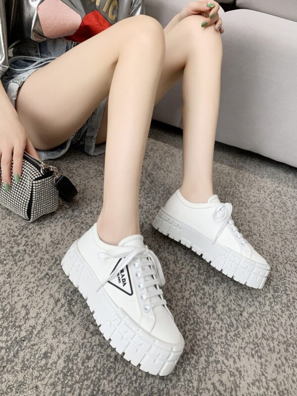sy_no_878C2928CDBA44C004805BC79FF023A1_2 Prada White Canvas Black-Trim Triangle Tread Platform Sneaker