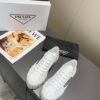sy_no_878C2928CDBA44C004805BC79FF023A1_5 Prada White Canvas Black-Trim Triangle Tread Platform Sneaker