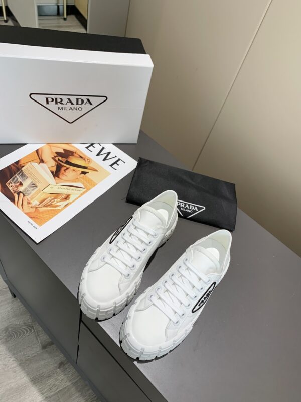 sy_no_878C2928CDBA44C004805BC79FF023A1_5 Prada White Canvas Black-Trim Triangle Tread Platform Sneaker