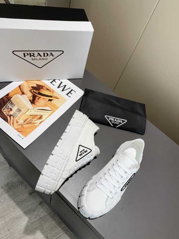 sy_no_878C2928CDBA44C004805BC79FF023A1_6 Prada White Canvas Black-Trim Triangle Tread Platform Sneaker