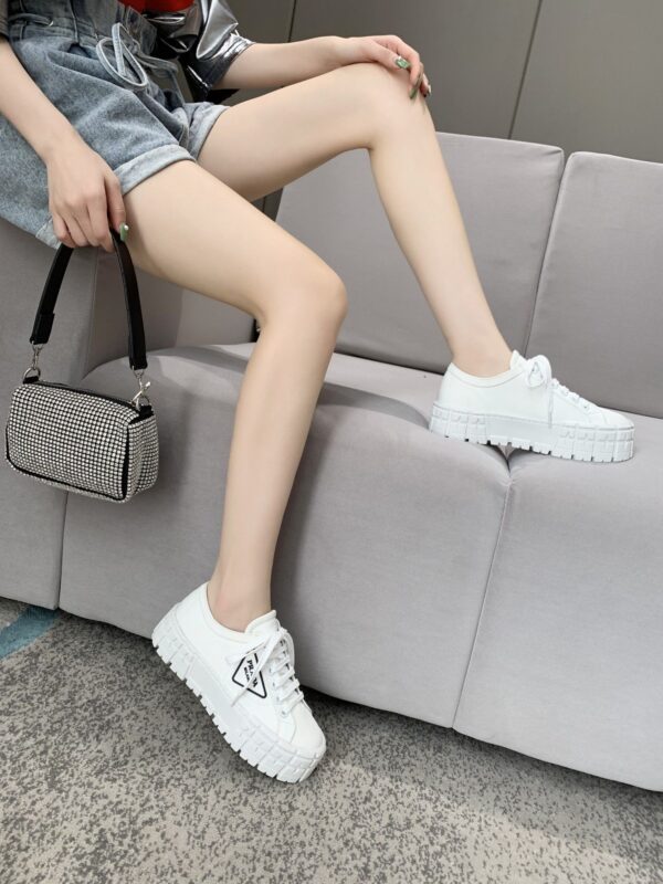 sy_no_878C2928CDBA44C004805BC79FF023A1_8 Prada White Canvas Black-Trim Triangle Tread Platform Sneaker