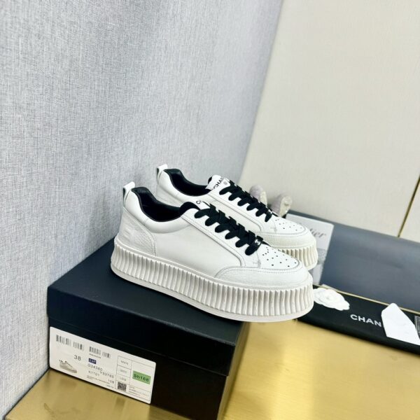 sy_no_89259C145494347802A26325E75A0481_4 Chanel Off-White Leather Platform Low-Top Sneaker with Black Laces and Ribbed Sole