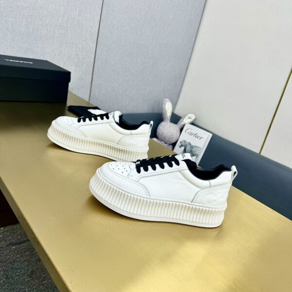 sy_no_89259C145494347802A26325E75A0481_5 Chanel Off-White Leather Platform Low-Top Sneaker with Black Laces and Ribbed Sole