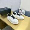 sy_no_89259C145494347802A26325E75A0481_8 Chanel Off-White Leather Platform Low-Top Sneaker with Black Laces and Ribbed Sole