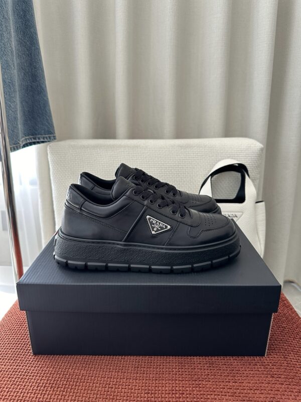 Prada All-Black Leather Metal Triangle Platform Sneaker