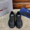 sy_no_8CA9FCC3D217E8A4254B61C3172F9DF9_0 Prada Black Leather Triangle Logo Thick-Sole Low-Top Sneaker