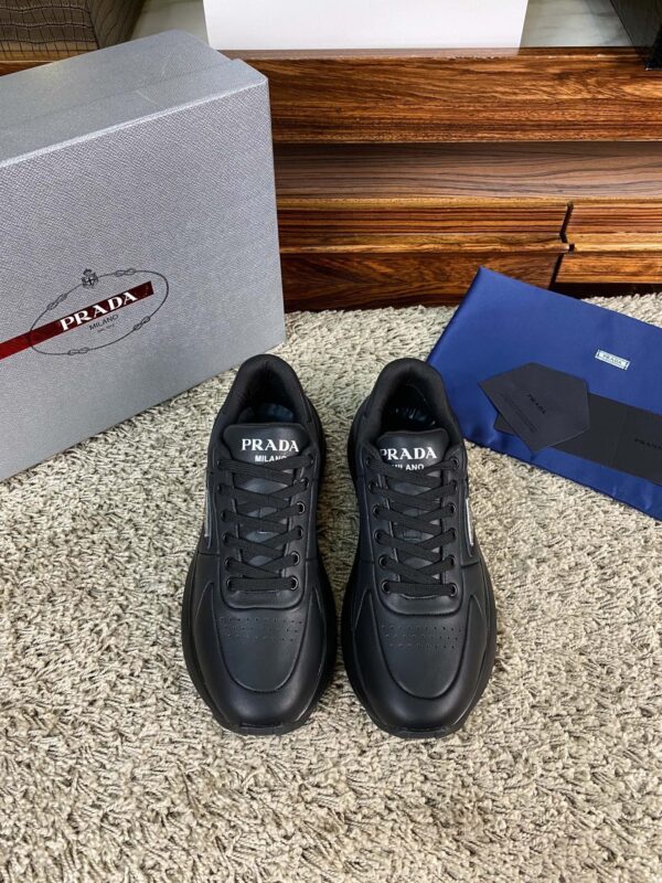 sy_no_8CA9FCC3D217E8A4254B61C3172F9DF9_0 Prada Black Leather Triangle Logo Thick-Sole Low-Top Sneaker