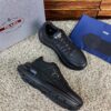 sy_no_8CA9FCC3D217E8A4254B61C3172F9DF9_2 Prada Black Leather Triangle Logo Thick-Sole Low-Top Sneaker
