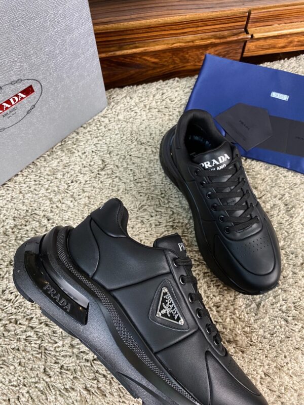 sy_no_8CA9FCC3D217E8A4254B61C3172F9DF9_4 Prada Black Leather Triangle Logo Thick-Sole Low-Top Sneaker