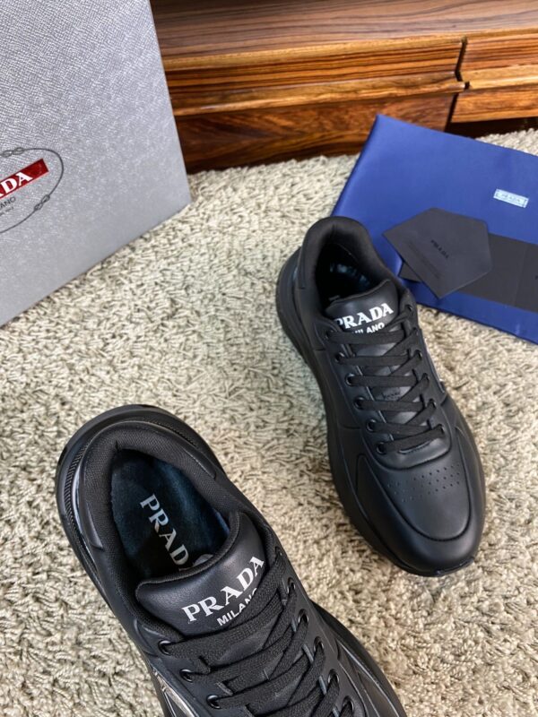 sy_no_8CA9FCC3D217E8A4254B61C3172F9DF9_5 Prada Black Leather Triangle Logo Thick-Sole Low-Top Sneaker