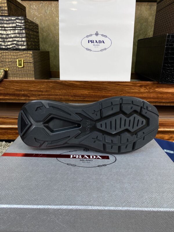 sy_no_8CA9FCC3D217E8A4254B61C3172F9DF9_7 Prada Black Leather Triangle Logo Thick-Sole Low-Top Sneaker