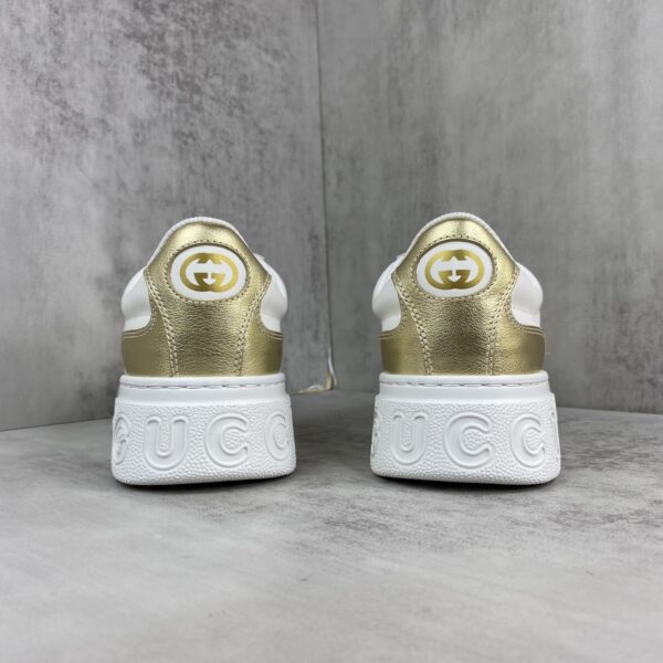 sy_no_8E3CA326170BB6ABA09C09097E89A85E_4 Gucci Metallic Gold & White Chunky Platform Sneaker with Web Stripe