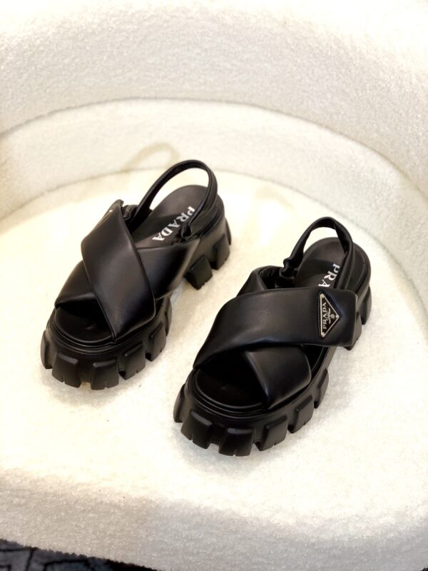 sy_no_8EE2691DC0254907DA6B3723D6CED176_0 Prada Black Cross-Strap Triangle Tread Platform Sandal