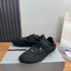 Prada Black Canvas Lace-Up Flat Sneaker