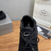 Prada Black Canvas Lace-Up Flat Sneaker