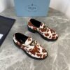 sy_no_A049757C8C1ACB1EC8A2BB18DDC4AD3B_0 Prada Brown White Cow Print Pony Hair Block Heel Loafer