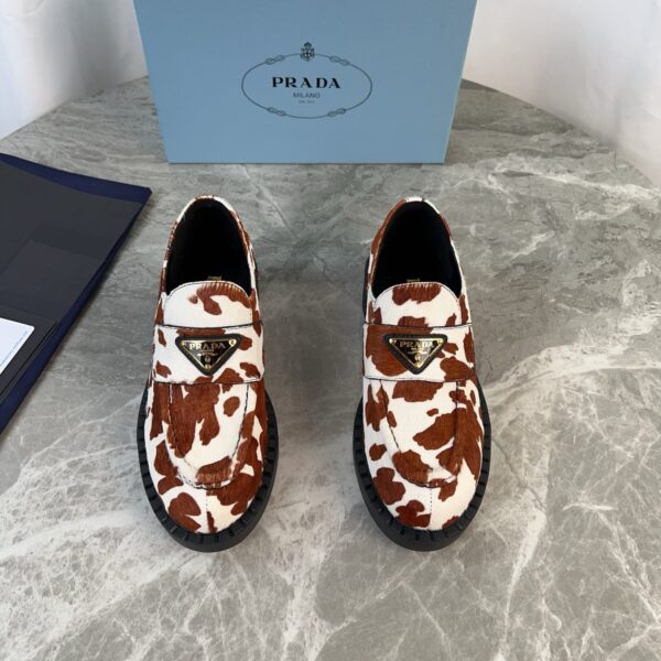 sy_no_A049757C8C1ACB1EC8A2BB18DDC4AD3B_1 Prada Brown White Cow Print Pony Hair Block Heel Loafer