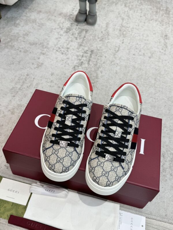 sy_no_A452867891CEFA573E8425B6CD338327_1 Gucci Screener GG Supreme Canvas Sneaker with Blue/Red Web Stripe