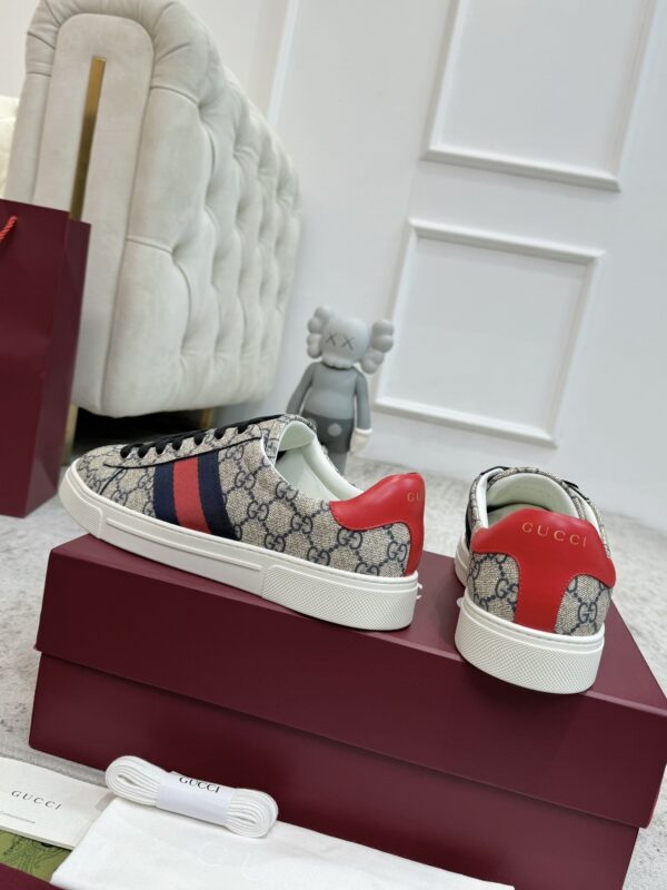 sy_no_A452867891CEFA573E8425B6CD338327_3 Gucci Screener GG Supreme Canvas Sneaker with Blue/Red Web Stripe