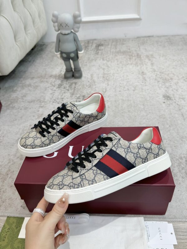 sy_no_A452867891CEFA573E8425B6CD338327_4 Gucci Screener GG Supreme Canvas Sneaker with Blue/Red Web Stripe