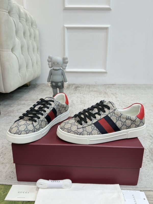 sy_no_A452867891CEFA573E8425B6CD338327_5 Gucci Screener GG Supreme Canvas Sneaker with Blue/Red Web Stripe