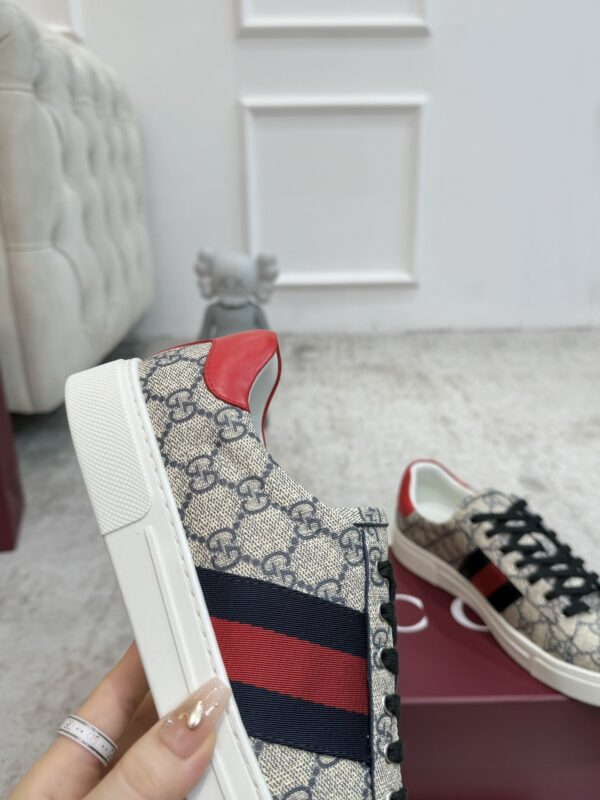 sy_no_A452867891CEFA573E8425B6CD338327_7 Gucci Screener GG Supreme Canvas Sneaker with Blue/Red Web Stripe