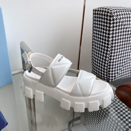 sy_no_A6F94DB344C4B2D844D65BEB68070FF3_0 Prada White Triangle Quilted Tread Platform Sandal