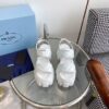 sy_no_A6F94DB344C4B2D844D65BEB68070FF3_1 Prada White Triangle Quilted Tread Platform Sandal