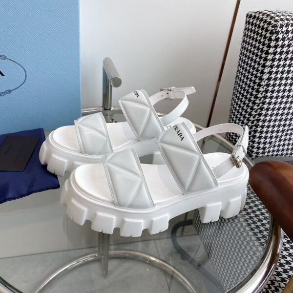 sy_no_A6F94DB344C4B2D844D65BEB68070FF3_2 Prada White Triangle Quilted Tread Platform Sandal