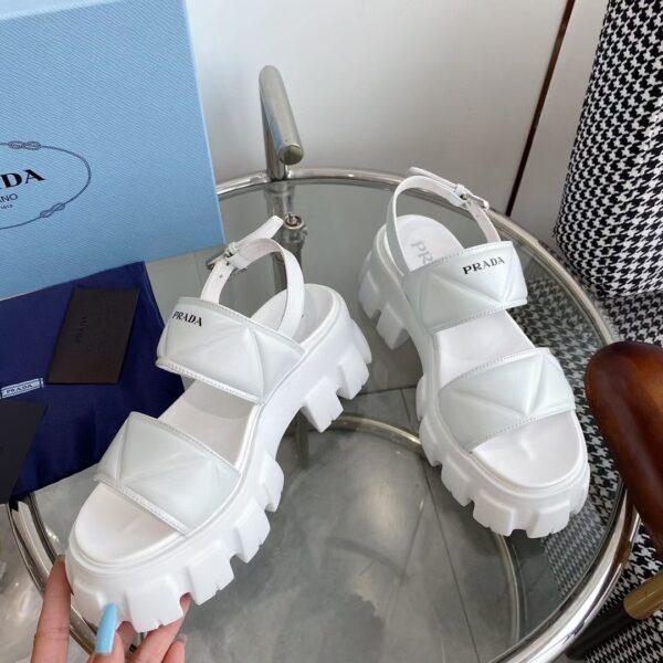 sy_no_A6F94DB344C4B2D844D65BEB68070FF3_3 Prada White Triangle Quilted Tread Platform Sandal