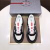 Prada Black-White Patent Mesh Red-Tongue Platform Sneaker