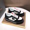 Prada Black-White Patent Mesh Red-Tongue Platform Sneaker