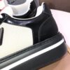 Prada Black-White Patent Mesh Red-Tongue Platform Sneaker