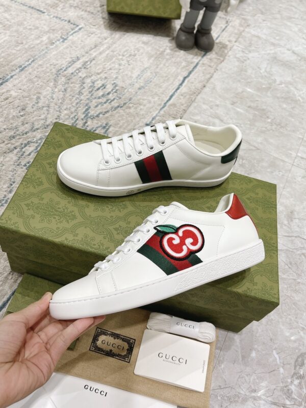 sy_no_A919EE0AC10E68ED0E33DB7D6F6A55BB_4 Gucci White Leather Low-Top Sneaker with Apple Interlocking G and Web Stripe