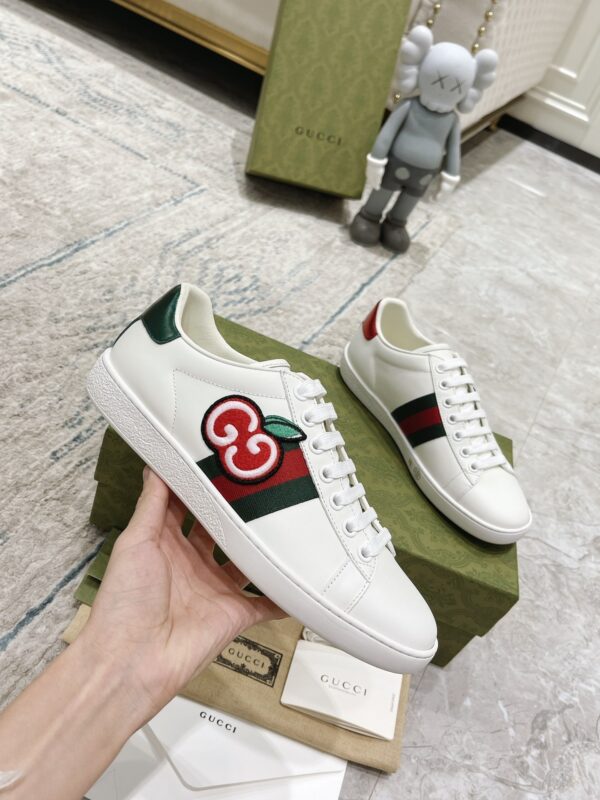 sy_no_A919EE0AC10E68ED0E33DB7D6F6A55BB_5 Gucci White Leather Low-Top Sneaker with Apple Interlocking G and Web Stripe