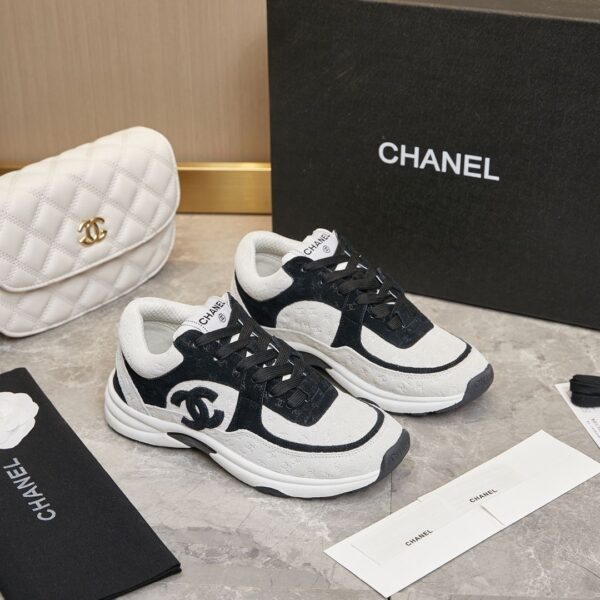 sy_no_AA1F80B4DE2C1D9D17DF0999DEB6E3B1_0 Chanel Black and White Monogram Embossed Low-Top Sneaker with Suede Detailing and CC Logo